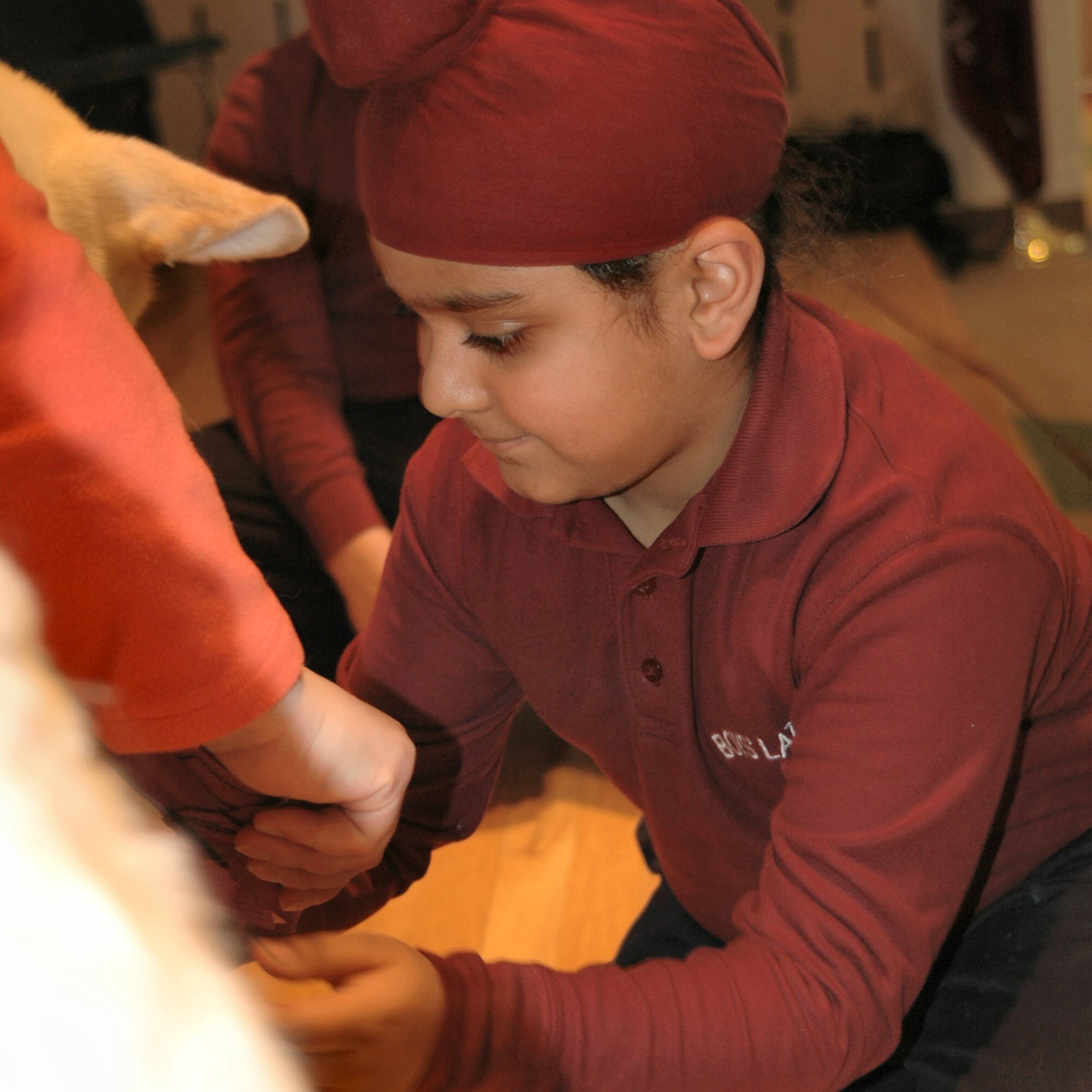 The program included both classroom and outdoor demonstrations on dog sledding and dryland dog sledding.
