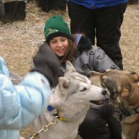 Zoe and Acadia wrestle on the picket line as one Girl Scout looks on.