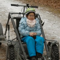 This Girl Scout waits calmly for her Maryland dog sledding adventure.