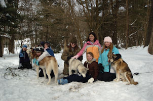 The Girl Scouts and dogs look happy - and tired!