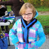 Posing with a dog sledding harness