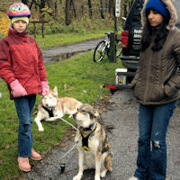 Posing with a dog sledding harness