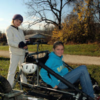 Passenger and musher.