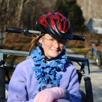 Girl scout excited for dryland dog sledding