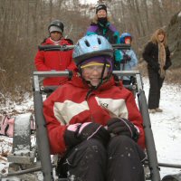 The Girl Scouts were excited to try dryland dog sledding.
