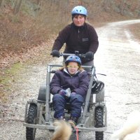Enjoying dryland dog sledding