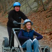 The Girl Scouts were each able to have dryland dog sled rides.