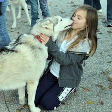 A Girl Scout gets a kiss from Acadia