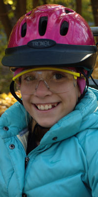 An excited girl scout before her ride
