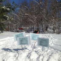 Snowy signs on the trail