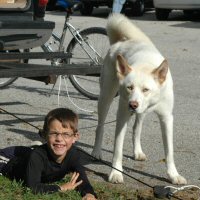 Okemo poses with one of the cub scouts